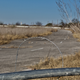 The pieces of asphalt that used to make up the figure-eight configuration can no longer be seen from outside of the race track.